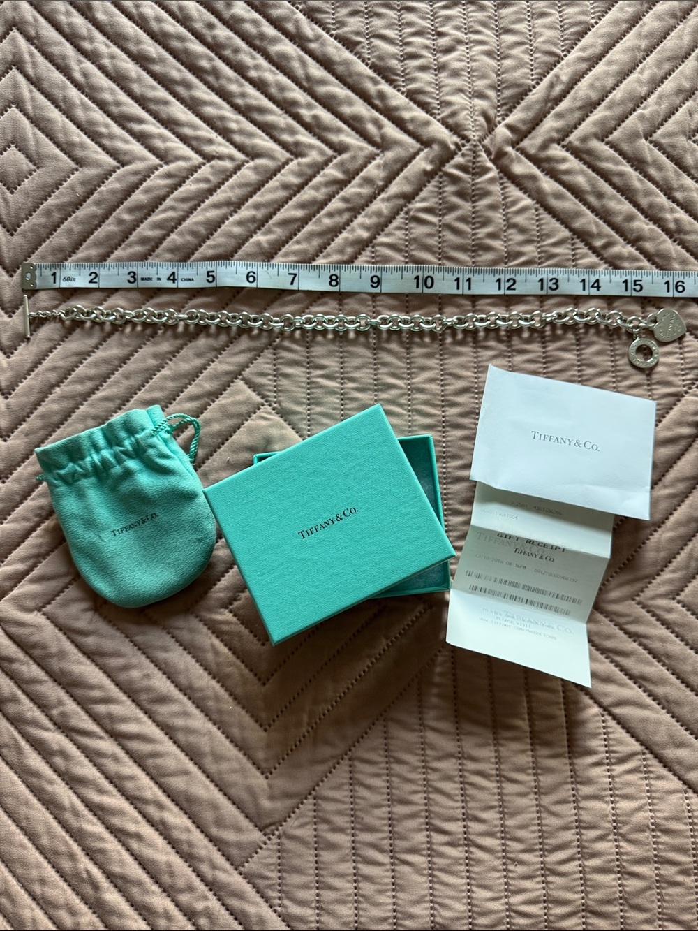 Tiffany & Co. Sterling Silver Charm necklace with Signature Blue Pouch and Box
